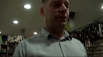 Busty libertine fucked by stranger in sexshop