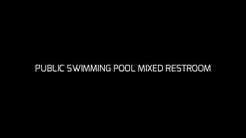SPY RESTROOM SWIMMING POOL: hard cock exposed for a big boobs woman